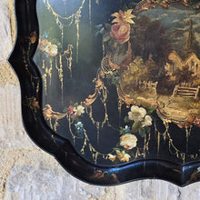 Load image into Gallery viewer, fine-quality-papier-mache-tray-impressed-makers-mark-b-walton-co-warranted-verso-scalloped-edge-gilt-decoration-black-gold-village-church-wolverhampton-style-lacquer-work-england-circa-1840s-for-sale-damon-blandford-antiques-scalloped-edge-rural-landscape-village-church-flowers-fine-trailing-gilt-swags-naturalistic-form-stark-contrast-black-ground-wolverhampton-style-japanning-lacquer-work-excellent-condition