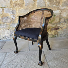 Load image into Gallery viewer, very-attractive-early-20th-century-tub-chair-chinoiserie-decoration-cane-work-seat-shaped-back-black-lacquered-hardwood-frame-cabriole-legs-ball-and-claw-feet-gilt-cinnabar-chinoiserie-decoration-featuring-flowers-foliage-pagoda-style-buildings-upholstered-loose-seat-pad-aesthetically-pleasing-comfortable-chinese-circa-1920-s-for-sale-damon-blandford-antiques-stow-on-the-wold-cotswold-antiques