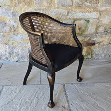 Load image into Gallery viewer, very-attractive-early-20th-century-tub-chair-chinoiserie-decoration-cane-work-seat-shaped-back-black-lacquered-hardwood-frame-cabriole-legs-ball-and-claw-feet-gilt-cinnabar-chinoiserie-decoration-featuring-flowers-foliage-pagoda-style-buildings-upholstered-loose-seat-pad-aesthetically-pleasing-comfortable-chinese-circa-1920-s-for-sale-damon-blandford-antiques-stow-on-the-wold-cotswold-antiques