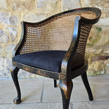 Load image into Gallery viewer, very-attractive-early-20th-century-tub-chair-chinoiserie-decoration-cane-work-seat-shaped-back-black-lacquered-hardwood-frame-cabriole-legs-ball-and-claw-feet-gilt-cinnabar-chinoiserie-decoration-featuring-flowers-foliage-pagoda-style-buildings-upholstered-loose-seat-pad-aesthetically-pleasing-comfortable-chinese-circa-1920-s-for-sale-damon-blandford-antiques-stow-on-the-wold-cotswold-antiques