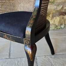 Load image into Gallery viewer, very-attractive-early-20th-century-tub-chair-chinoiserie-decoration-cane-work-seat-shaped-back-black-lacquered-hardwood-frame-cabriole-legs-ball-and-claw-feet-gilt-cinnabar-chinoiserie-decoration-featuring-flowers-foliage-pagoda-style-buildings-upholstered-loose-seat-pad-aesthetically-pleasing-comfortable-chinese-circa-1920-s-for-sale-damon-blandford-antiques-stow-on-the-wold-cotswold-antiques