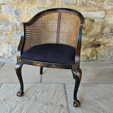 Load image into Gallery viewer, very-attractive-early-20th-century-tub-chair-chinoiserie-decoration-cane-work-seat-shaped-back-black-lacquered-hardwood-frame-cabriole-legs-ball-and-claw-feet-gilt-cinnabar-chinoiserie-decoration-featuring-flowers-foliage-pagoda-style-buildings-upholstered-loose-seat-pad-aesthetically-pleasing-comfortable-chinese-circa-1920-s-for-sale-damon-blandford-antiques-stow-on-the-wold-cotswold-antiques