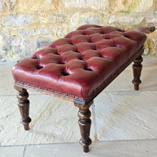 Load image into Gallery viewer, Striking-19th-century-stool-good-size-proportions-upholstered-deep-buttoned-oxblood-red-leather-turned-faux-bois-legs-simulated-rosewood-black-golden-brown-colours-eye-catching-furniture-function-well-living-room-bed-room-hall-crop-whip-bdsm-for-sale-damon-blandford-antiques-stroud-cotswolds