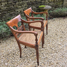 Load image into Gallery viewer, very-attractive-pair-19th-century-anglo-indian-colonial-armchairs-raffles-style-beautifully-hand-carved-teak-back-deep-shaped-crest-rails-scrolled-ends-reeded-mid-rails-down-swept-arms-baluster-shape-supports-caned-seats-fluted-legs-front-square-swept-legs-rear-attractive-comfortable-circa-1850-s-for-sale-damon-blandford-antiques-stow-on-the-wold