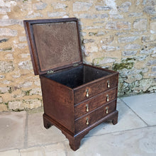 Load image into Gallery viewer, really-good-18th-century-early-oak-log-bin-small-faux-chest-three-drawers-moulded-lift-up-top-fitted-interior-removable-zinc-storage-bin-original-brass-drop-handles-bracket-feet-excellent-condition-good-colour-wear-velvet-seat-pad-informal-fireside-seat-for-sale-stow-on-the-wold-damon-blandford-antiques-cotswolds