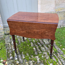 Load image into Gallery viewer, Fine-quality-late-19th-century-georgian-drop-leaf-pembroke-table-butterfly-shaped-top-frieze-drawer-bramah-lock-false-drawer-front-turned-wooden-drawer-pulls-tapered-ring-turned-legs-original-brass-cup-castors-really-attractive-useful-occasional-table-excellent-colour-for-sale-damon-blandford-antiques-cotswolds-stow-on-the-wold