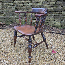 Load image into Gallery viewer, Well-proportioned-19th-century-ash-elm-captains-smokers-bowback-armchair-features-wide-bow-back-deep-scrolled-crest-rail-ring-turned-spindles-well-figured-saddle-seat-bulbous-baluster-shape-legs-H-shape-stretcher-DC-good-solid-comfortable-chair-excellent-condition-for-sale-damon-blandford-antiquesd-stow-on-the-wold-cotswolds