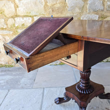 Load image into Gallery viewer, excellent-quality-table-features-cuban-mahogany-top-two-drop-leaves-two-faux-two-working-drawers-fitted-writing-slope-cock-beading-decorative-brass-knob-drawers-pulls-reeded-baluster-shape-pedestal-plinth-base-lion-paw-feet-good-condition-attractive-use-sofa-side-lamp-table-english-circa-1830-for-sale-damon-blandford-antiques-stow-on-the-wold-cotswold