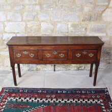 Load image into Gallery viewer, really-good-colour-provincial-cherrywood-serving-console-sofa-table-george-II-III-georgian-two-plank-top-applied-mouldings-three-drawers-rebated-butt-joint-construction-carved-cock-beading-pierced-brass handles-escutcheons-apron-panels-circular-tapered-legs-incredibly-attractive-table-fabulous-patination-good-usable-condition-time-worn-appearance-tremendous-aesthetic-appeal-small-proportions-northern-england-circa-1760-for-sale-damon-blandford-antiques-stow-on-the-wold-cotswolds-decorative-interiors-design