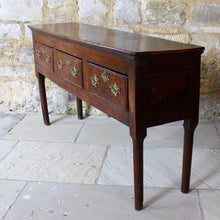 Load image into Gallery viewer, really-good-colour-provincial-cherrywood-serving-console-sofa-table-george-II-III-georgian-two-plank-top-applied-mouldings-three-drawers-rebated-butt-joint-construction-carved-cock-beading-pierced-brass handles-escutcheons-apron-panels-circular-tapered-legs-incredibly-attractive-table-fabulous-patination-good-usable-condition-time-worn-appearance-tremendous-aesthetic-appeal-small-proportions-northern-england-circa-1760-for-sale-damon-blandford-antiques-stow-on-the-wold-cotswolds-decorative-interiors-design