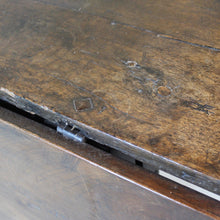 Load image into Gallery viewer, early-18th-century-credence-table-fabulous-patination-three-hundred-years-of-use-oval-shaped-walnut-top-drop-leaf-oak-base-three-baluster-shaped-legs-gate-leg-sanctuary-christian-worship-celebration-eucharist-remembrance-celebration-community-blacksmith-forged-hinges-important-ecclesiastical-furniture-characterful-useful-furniture-very-good-condition-side-occasional-table-english-circa-1725-for-sale-damon-blandford-antiques-stow-on-the-wold-cotswolds