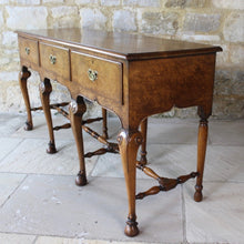 Load image into Gallery viewer, very-fine-quality-queen-anne-revival-serving-console-table-by-hamptons-pall-mall-london-beautifully-figured-pollard-oak-top-with-moulded-edge-drawers-brass-drop-handles-shaped-frieze-particularly-attractive-eight-crisply-carved-cabriole-legs-hoof-feet-united-by-turned-stretches-stylish-london-cabinet-makers-excellent-condition-wonderful-colour-console-sofa-table-tremendous-traditional-contemporary-settings-english-circa-1900-for-sale-damon-blandford-antiques-stow-on-the-wold-furniature-interior
