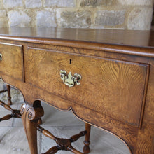 Load image into Gallery viewer, very-fine-quality-queen-anne-revival-serving-console-table-by-hamptons-pall-mall-london-beautifully-figured-pollard-oak-top-with-moulded-edge-drawers-brass-drop-handles-shaped-frieze-particularly-attractive-eight-crisply-carved-cabriole-legs-hoof-feet-united-by-turned-stretches-stylish-london-cabinet-makers-excellent-condition-wonderful-colour-console-sofa-table-tremendous-traditional-contemporary-settings-english-circa-1900-for-sale-damon-blandford-antiques-stow-on-the-wold-furniature-interior