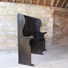 Load image into Gallery viewer, painted-pine-and-elm-settle-three-panels-along-back-framed-by-moulded-stiles-winged-ends-bench-seat-single-drawer-swan-neck-handle-useful-storage space-shaped-winged-ends-concave-arms-particularly-attractive-vernacular-furniture-original-black-brown-painted-finish-fabulous-contrasting-golden-honey-colour-settle-excellent-condition-regional-furniture-hallway-boot-room-kitchen-english-early-1800's-for-sale-damon-blandford-antiques-stroud-stow-on-the-wold-cotswolds-country-interior-home-design