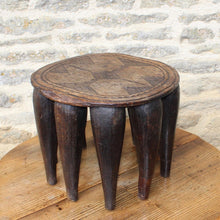 Load image into Gallery viewer, good-late-c19th-early-c20th-tribal-nupe-stool-elephant-table-carved-single-piece-hardwood-top-decorated-geometric-design-ten-shaped-legs-traditionally-made-nupe-people-central-nigeria-gift-grooms-to-brides-highly-decorative-tribal-art-for-sale-side-table-private-collection-damon-blandford-antiques-stow-on-the-wold-cotswolds-interiors