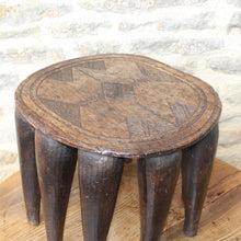 Load image into Gallery viewer, good-late-c19th-early-c20th-tribal-nupe-stool-elephant-table-carved-single-piece-hardwood-top-decorated-geometric-design-ten-shaped-legs-traditionally-made-nupe-people-central-nigeria-gift-grooms-to-brides-highly-decorative-tribal-art-for-sale-side-table-private-collection-damon-blandford-antiques-stow-on-the-wold-cotswolds-interiors