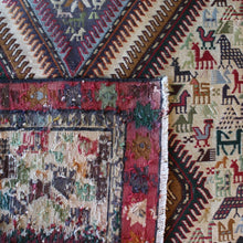 Load image into Gallery viewer, stunning-sumac-runner-featuring-six-adjoined-central-medallions-profusion-of-ark-animal-motifs-main-boarder-star-motifs-red-ground-happiness-fertility-noah's-ark-mount-ararat-eastern-anatolia-Iran. Sumac-loom-kilims-weaving-technic-anatolia-circa-1950's-for-sale-damon-blandford-antiques-phil-taylors-cool-stuff-stroud-gloucestershire-cotswolds-interior