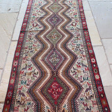 Load image into Gallery viewer, stunning-sumac-runner-featuring-six-adjoined-central-medallions-profusion-of-ark-animal-motifs-main-boarder-star-motifs-red-ground-happiness-fertility-noah's-ark-mount-ararat-eastern-anatolia-Iran. Sumac-loom-kilims-weaving-technic-anatolia-circa-1950's-for-sale-damon-blandford-antiques-phil-taylors-cool-stuff-stroud-gloucestershire-cotswolds-interior