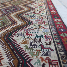 Load image into Gallery viewer, stunning-sumac-runner-featuring-six-adjoined-central-medallions-profusion-of-ark-animal-motifs-main-boarder-star-motifs-red-ground-happiness-fertility-noah's-ark-mount-ararat-eastern-anatolia-Iran. Sumac-loom-kilims-weaving-technic-anatolia-circa-1950's-for-sale-damon-blandford-antiques-phil-taylors-cool-stuff-stroud-gloucestershire-cotswolds-interior