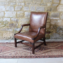 Load image into Gallery viewer, good-18th-century-english-georgian-library-gainsborough-armchair-generous-proportions-constructed-in-mahogany-square-shaped-back-flanked-by-upholstered-arms-concave-shaped-arm-supports-square-shaped-legs-united-by-H-shape-stretcher-very-good-solid-condition-re-upholstered-dark-tan-leather-english-circa-1770s-1780s-for-sale-damon-blandford-antiques-stroud-stow-on-the-wold-cotswolds-country-house-antiques-fine-furniture-seating