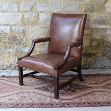 Load image into Gallery viewer, good-18th-century-english-georgian-library-gainsborough-armchair-generous-proportions-constructed-in-mahogany-square-shaped-back-flanked-by-upholstered-arms-concave-shaped-arm-supports-square-shaped-legs-united-by-H-shape-stretcher-very-good-solid-condition-re-upholstered-dark-tan-leather-english-circa-1770s-1780s-for-sale-damon-blandford-antiques-stroud-stow-on-the-wold-cotswolds-country-house-antiques-fine-furniture-seating