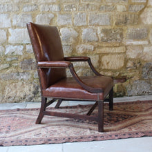 Load image into Gallery viewer, good-18th-century-english-georgian-library-gainsborough-armchair-generous-proportions-constructed-in-mahogany-square-shaped-back-flanked-by-upholstered-arms-concave-shaped-arm-supports-square-shaped-legs-united-by-H-shape-stretcher-very-good-solid-condition-re-upholstered-dark-tan-leather-english-circa-1770s-1780s-for-sale-damon-blandford-antiques-stroud-stow-on-the-wold-cotswolds-country-house-antiques-fine-furniture-seating