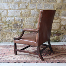 Load image into Gallery viewer, good-18th-century-english-georgian-library-gainsborough-armchair-generous-proportions-constructed-in-mahogany-square-shaped-back-flanked-by-upholstered-arms-concave-shaped-arm-supports-square-shaped-legs-united-by-H-shape-stretcher-very-good-solid-condition-re-upholstered-dark-tan-leather-english-circa-1770s-1780s-for-sale-damon-blandford-antiques-stroud-stow-on-the-wold-cotswolds-country-house-antiques-fine-furniture-seating