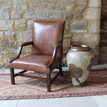 Load image into Gallery viewer, good-18th-century-english-georgian-library-gainsborough-armchair-generous-proportions-constructed-in-mahogany-square-shaped-back-flanked-by-upholstered-arms-concave-shaped-arm-supports-square-shaped-legs-united-by-H-shape-stretcher-very-good-solid-condition-re-upholstered-dark-tan-leather-english-circa-1770s-1780s-for-sale-damon-blandford-antiques-stroud-stow-on-the-wold-cotswolds-country-house-antiques-fine-furniture-seating