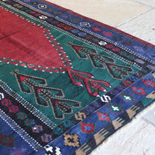 Load image into Gallery viewer, finely-woven-turkish-kilim-obruk-konya-wedding-gift-predominantly-red-green-blue-black-colours-akimbo-motifs-symbolising-motherhood-large-single-medallion-main-boarder-repeating-protective-eye-motifs-excellent-condition-floor-rug-wall-hanging-turkey -circa-1930s-40s-for-sale-damon-blandford-antiques-stroud-cotswolds-phil-taylors-cool-stuff-interior-design-rug-kilim-carpect-floor-persian