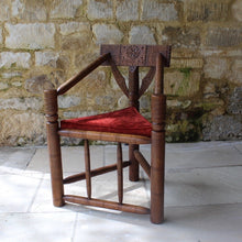 Load image into Gallery viewer, copy-of-the-old-saxon-chair-from-lord-leycesters-hospital-warwick-chair-of-ttriangular-form-chip-carved-to-same-design-by-victorian-chair-maker-john-starkey-further-example-victoria-and-albert-museum-london-comfortable-excellent-original-condition-new-bespoke-velvet-cushion-for-sale-damon-blandford-antiques-stroud-cotswolds-seating