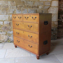 Load image into Gallery viewer, exceptionally-well-made-late-19th-century-teak-anglo-indian-chest-of-drawers-two-sections-blacksmith-forged-swing-carry-handles-upper-lower-sections-two short-three-long-drawers-brass-swan-neck-handles-molded-drawer-fronts-ebony-escutcheons-turned-feet-panel-back-quality-construction-incredibly-solid-well-made-military-campaign-travel-furniture-restricted-access-small-spaces-for-sale-damon-blandford-antiques-stow-on-the-wold-stroud-cotswolds-antiques-circa-1890