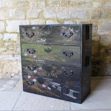 Load image into Gallery viewer, decorative-japanese-tansu-chest-fourth-quarter-edo-period-traditional-japanese-two-part-chest-iron-carry-handles-storing-clothing-decorated-chinoiserie-overlay-featuring-flowers-foliage-black-ground-long-short-drawers-door-drop-handles-incredibly-attractive-useful-storage-furniture-very-good-condition-japan-circa-1840-60-for-sale-damon-blandford-antiques-stroud-stow-on-the-wold-cotswolds-home-interior