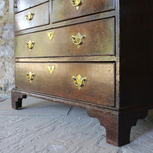 Load image into Gallery viewer, good-quality-18th-century-bureau-constructed-in-oak-fall-front-supported-by-two lopers-bearers-fitted-interior-nine-pigeon-holes-five-small-drawers-concealed-storage-well-two-short-two-long-drawers-dovetail-construction-brass-drop-handles-bracket-feet-highly-original-regional-furniture-excellent-condition-good-colour.-for-sale-damon-blandford-antiques-stow-on-the-wold-cotswolds-antique-strorage