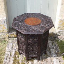 Load image into Gallery viewer, fine-late-19th-anglo-indian-octagonal-table-padauk-wood-decorative-brass-inlay-to-top-crisply-carved-fruit-and-foliage-highly-decorative-table-folding-flat-transportation-storage-highly-versatile-function-occasional-side-center-table-excellent-condition-circa-1890s-for-sale-damon-blandford-antiques-stow-on-the-wold-cotswolds