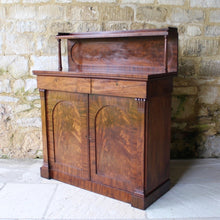 Load image into Gallery viewer, Attractive-victorian-mahogany-chiffonier-well-figured-flame-mahogany-veneers-upper-shelf-turned-mahogany-supports-form-of-classical-columns-frieze-drawers-cupboard-doors-oval-panels-storage-space-height-adjustable-shelves-plinth-base-elegant-highly-functional-design-clean-classical-lines-for-sale-damon-blandford-antiques-stow-on-the-wold-cotswolds-for-sale-damon-blandford-antiques-antique-storage-solutions