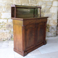 Load image into Gallery viewer, Attractive-victorian-mahogany-chiffonier-well-figured-flame-mahogany-veneers-upper-shelf-turned-mahogany-supports-form-of-classical-columns-frieze-drawers-cupboard-doors-oval-panels-storage-space-height-adjustable-shelves-plinth-base-elegant-highly-functional-design-clean-classical-lines-for-sale-damon-blandford-antiques-stow-on-the-wold-cotswolds-for-sale-damon-blandford-antiques-antique-storage-solutions