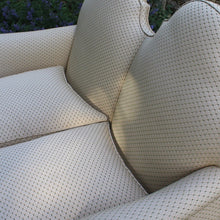 Load image into Gallery viewer, excellent-quality-two-seater-jacobean-revival-settee-generous-proportions-camel-back-scrolled-arms-loose-feather-cushion-seat-pads-shaped-frieze-carved-show-wood-legs-square-swept-legs-rear-beautifully-upholstered-high-quality-cream-green-colour-fabric-piped-edging-english-circa-1900-for-sale-damon-blandford-antiques-cotswolds-seating