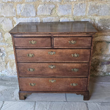 Load image into Gallery viewer, good-late-18th-century-oak-chest-of-drawers-constructed-from-well-figured-timbers-two-short-three-long-graduated-drawers-ovolo-moulding-original-brass-drop-handles-bracket-feet-good-colour-excellent-restored-condition-for-sale-damon-blandford-antiques-stroud-cotswolds-antique-furniture-storage