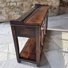 Load image into Gallery viewer, excellent-colour-georgian-oak-dresser-with-open-rack-three-shelves-moulded-cornice-hand-forged-iron-hooks-drawers-lined-in-pine-drawer-fronts-moulded-edges-brass-swan-neck-drop-handles-raised-on-primitive-supports-pot-board-excellent-condition-fresh-to-market-circa-1780-1800-for-sale-damon-blandford-antiques-stow-on-the-wold-kitchen-dinning-room-furniture