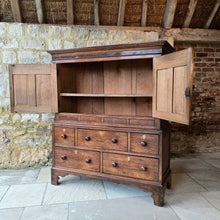 Load image into Gallery viewer, Good-well-proportioned-furniture-early19th- oak—court-cupboard-excellent-storage-top-section-canted-corners-spiral-design-flanking-ogee-panel-doors-shelf-moulded-cornice-mahogany-band-bottom-section-cock-bead-drawers-lined-pine-turned-wooden-drawer-pulls-bracket-feet-excellent-condition-good-warm-honey-colour-tones-North-West-Welsh-Borders-circa-1810-1820-for-sale-damon-blandford-antiques-stow-on-the-wold-early-oak