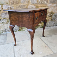 Load image into Gallery viewer, Good-colour-early-georgian-oak-side-table-lowboy-three-overlapping-drawers-ovolo-mouldings-retaining-original-brass-handles-shaped-frieze-cabriole-legs-pad-feet-solid-stable-condition-honest-attractive-useful-english-circa-1720s-for-sale-damon-blandford-antiques-stow-on-the-wold-cotswolds