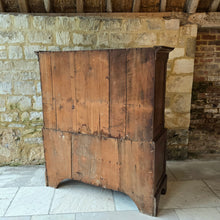 Load image into Gallery viewer, Good-well-proportioned-furniture-early19th- oak—court-cupboard-excellent-storage-top-section-canted-corners-spiral-design-flanking-ogee-panel-doors-shelf-moulded-cornice-mahogany-band-bottom-section-cock-bead-drawers-lined-pine-turned-wooden-drawer-pulls-bracket-feet-excellent-condition-good-warm-honey-colour-tones-North-West-Welsh-Borders-circa-1810-1820-for-sale-damon-blandford-antiques-stow-on-the-wold-early-oak