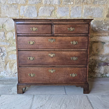 Load image into Gallery viewer, good-late-18th-century-oak-chest-of-drawers-constructed-from-well-figured-timbers-two-short-three-long-graduated-drawers-ovolo-moulding-original-brass-drop-handles-bracket-feet-good-colour-excellent-restored-condition-for-sale-damon-blandford-antiques-stroud-cotswolds-antique-furniture-storage
