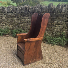 Load image into Gallery viewer, good-example-vernacular-lambing-chair-painted-pine-boarded-paneled-back-shaped-crest-rail-side-wings-generous-shaped-arm-supports-boarded-seat-drawer-under-seat-storage-shepherds-lambing-raked-back-rests-comfortable-side-wings-lancashire-circa-1800-late-C18th-earlyC19th-century-for-sale-damon-blandford-antiques-stow-on-the-wold-cotswolds