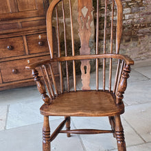 Load image into Gallery viewer, Well-proportioned-windsor-armchair-constructed-in-ash-elm-seat-fruitwood-splat-hoop-stick-back-central-shaped-splat-pierced-decoration-arm-bow-baluster-shape-supports-saddled-seat-turned-legs-H-shape-stretcher-very-comfortable-excellent-solid-condition-Lincolnshire-circa-1860-90-for-sale-damon-blandford-antiques-stow-on-the-wold-anttique-seating
