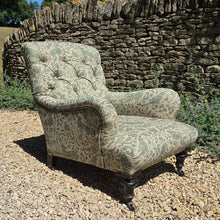 Load image into Gallery viewer, good-excellent-quality-mid-19th-century-armchair-upholstered-chair-shaped-button-back-curved-upholstered-arms-style-of-Howard-&-Sons-ebonised-turned-legs-brass-castors-black-ceramic-wheels-square-swept-legs-rear-incredibly-comfortable armchair-newly-re-upholstered-high-quality-printed-linen-featuring-bird-hare-motifs-attractive-for-sale-low-library-chair-damon-blandford-antiques-stow-on-the-wold-cotswolds