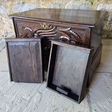 Load image into Gallery viewer, -coffer-bach-welsh-country-furniture-featuring-carved-dragon-highly-decorative-18th-century-welsh-oak-coffer-bach-lid-drawer-fronts-with-moulded-ovolo-edge-storage-space-oak-lined-drawers-overlapping-ovolo-moulding-brass-drop-handles-plinth-base-excellent-condition-for-sale-damon-blandford-antiques-stow-on-the-wold-cotswolds