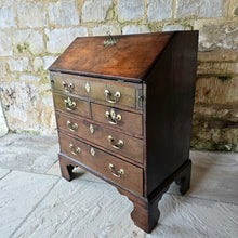 Load image into Gallery viewer, virginia-black-walnut-wonderful-small-proportions-magnificent-bureau-well-figured-fall-front-fitted-interior-drawers-pigeon-holes-storage-well-escutcheons-swan-neck-handles-bracket-feet-excellent-condition-north-america-navel-stores-act-1721-english-circa-1720s-1730s-1740s-1750s-for-sale-damon-blandford-antiques-stow-on-the-wold-cotswolds