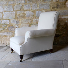 Load image into Gallery viewer, Victorian-seating-easy-arm-chair-rolled-arms-sprung-seat-upholstered-calico-turned-forelegs-brass-caps-brown-ceramics-castors-hampton-&-sons-damon-blandford-antiques-seating-lounge-chair-upholstery-for-sale-gloucestershire-cotswolds-quality-style-country-house-interiors