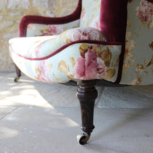 Load image into Gallery viewer, two-small-seater-upholstered-sofa-settee-turned-rosewood-legs-square-swept-concave-brass-cators-stamped-holland-&-sons-damon-blandford-antiques-chair-seating-for-sale-gloucestershire-chintz-floral-velvet-burgundy-roses-quality-fine-london-maker